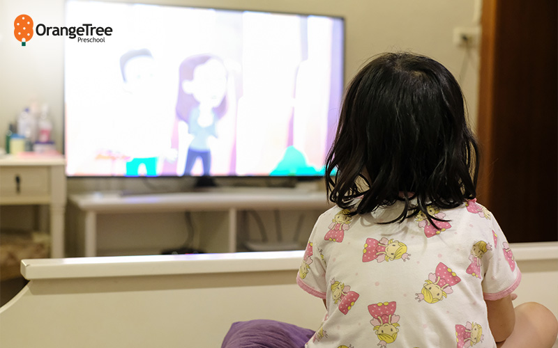 Child watching educational content on TV.