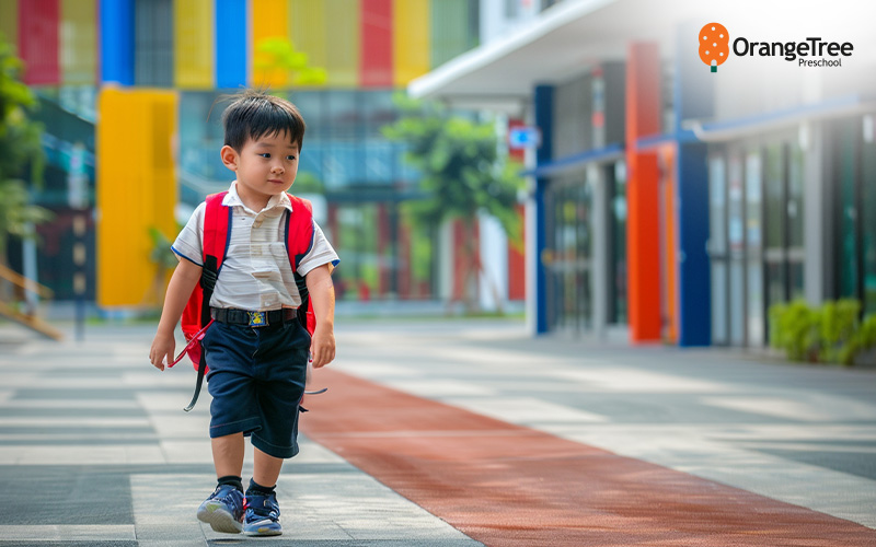 Young_boy_with_a_backpack_walking_to_preschool Young boy with a backpack walking to preschool.