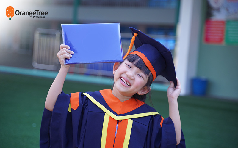 child wearing graduation clothes